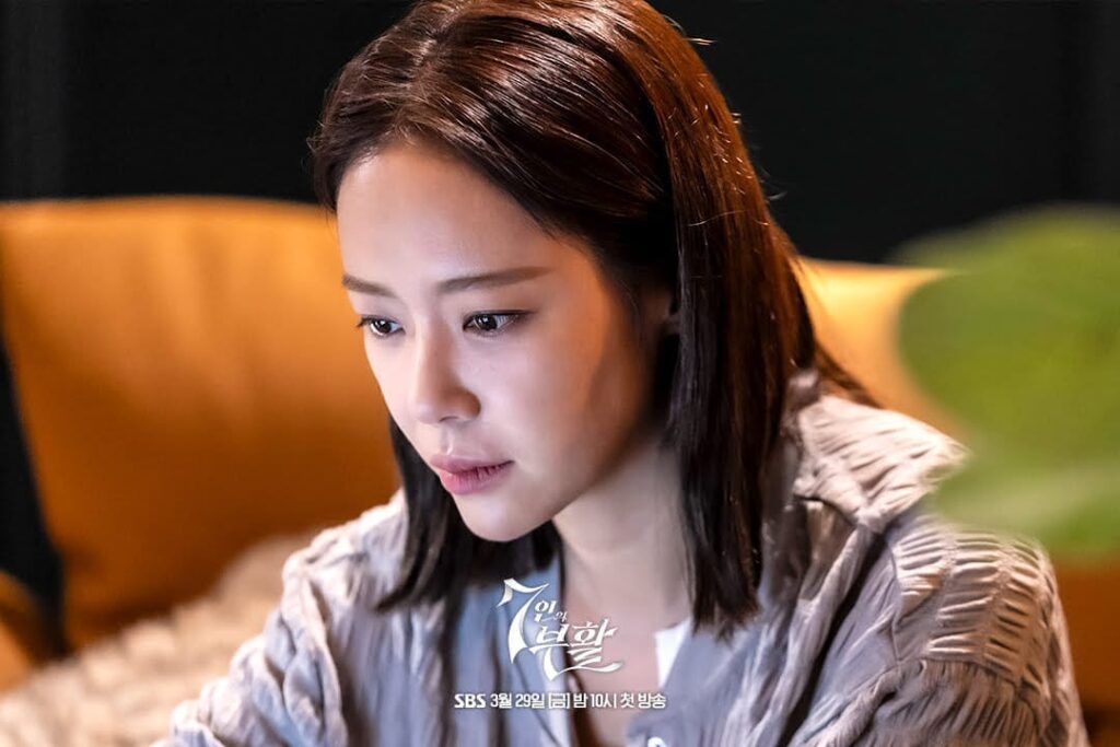 Geum Ra Hee first episode shows Geum Ra Hee staring intently at a laptop screen Geum Ra Hee first episode shows Geum Ra Hee staring intently at a laptop screen