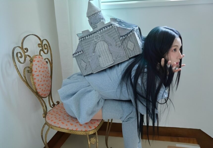 Chaeyoung of TWICE posing in a photoshoot for her solo album LIL FANTASY vol.1, highlighting her first solo project with artistic styling, expressive pose, and visual concept for SHOOT (Firecracker), released September 12, 2025.