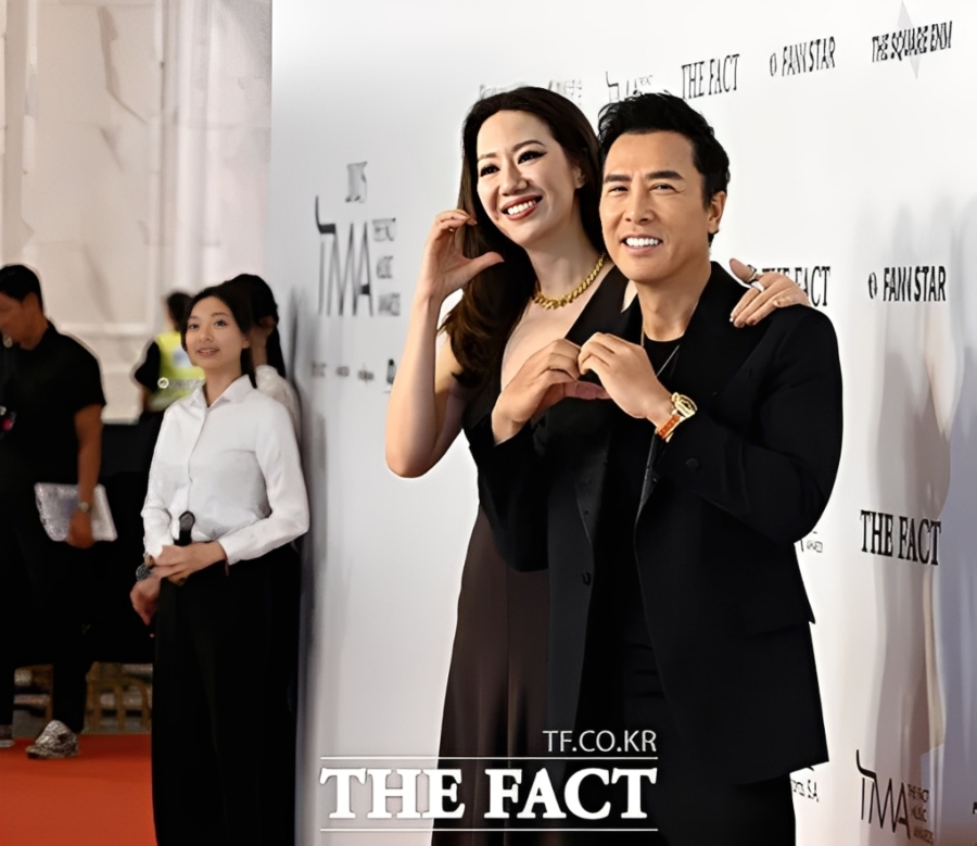 Donnie Yen presents at 2025 The Fact Music Awards in Macao Donnie Yen, and his wife Cissy Wang.