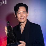 Lee Jung-jae, ‘Squid Game’ actor and Artist Company founder, holding the Charlie Chaplin Lifetime Achievement Award in Singapore ceremony 2025 — first Korean recipient, global film honor.