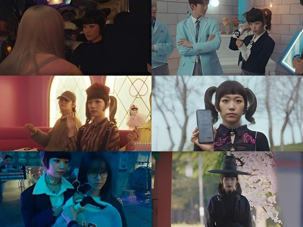 Kim Seul-gi portraying Ko Taeng-ja, also known as Black Finger, in Spirit Fingers - wearing a black robe and lip makeup, exuding chic, mysterious energy just like the original webtoon.